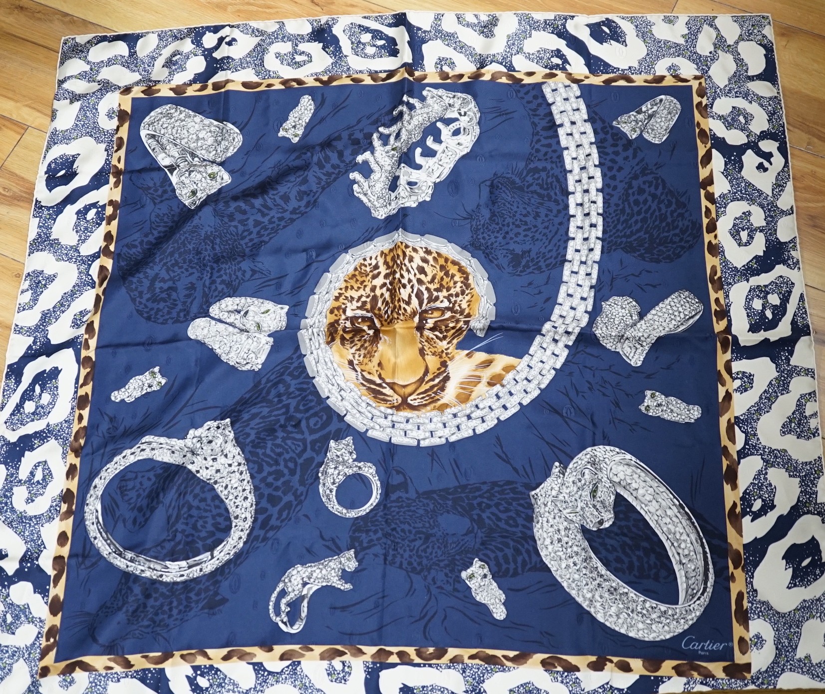 A Cartier silk scarf with Leopard motif